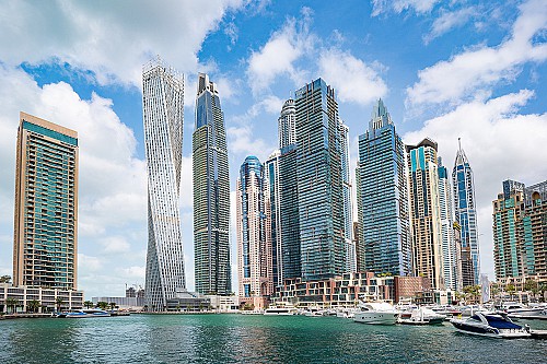 Why does it worth becoming a resident in Dubai?